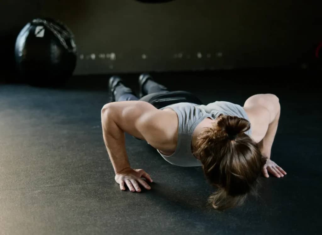 Minimalist Strength Training: 7 Proven Techniques for Great Results 5 man doing pushups