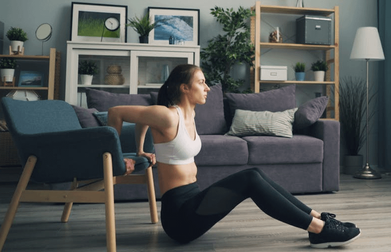 Get Strong, Stay Strong: Senior Workouts Without Equipment 4 a woman performing chair dips